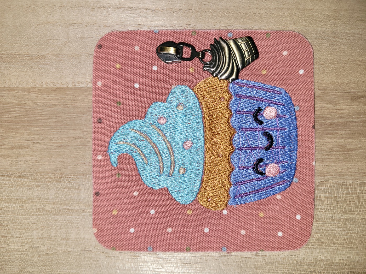 Smiling cupcake embroidery from Food with Faces