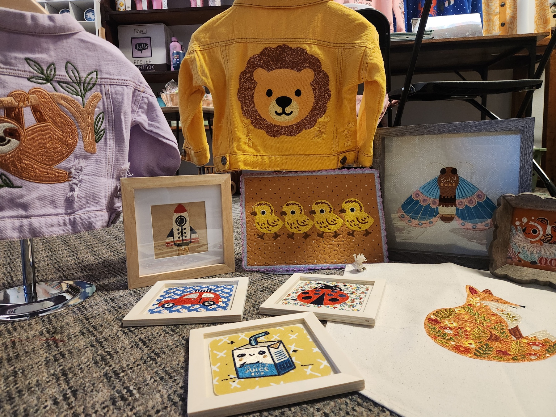A colorful market display filled with real Ignite Wonder embroidery sewouts